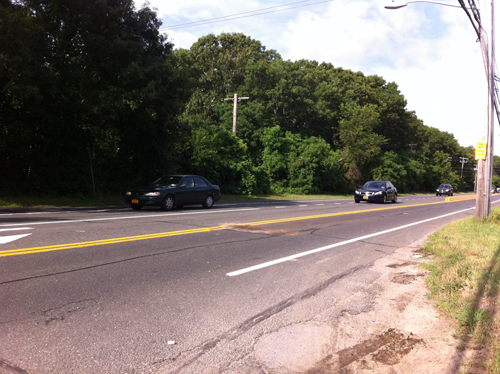 CARRIE MILLER PHOTO | The crash happened along the north side of Route 25A, just a few few feet west of Randall Road.