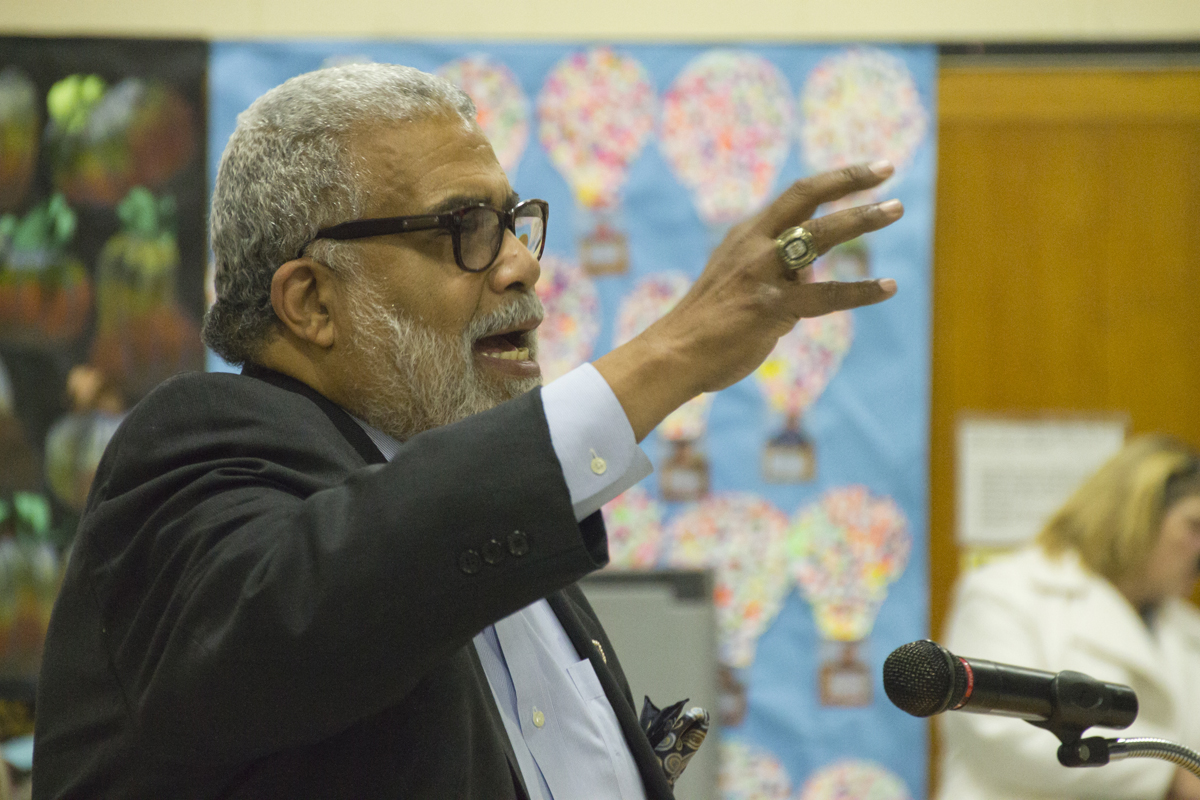 The Rev. Charles Coverdale speaks to the Riverhead school board at its meeting Tuesday night. (Credit: Paul Squire)