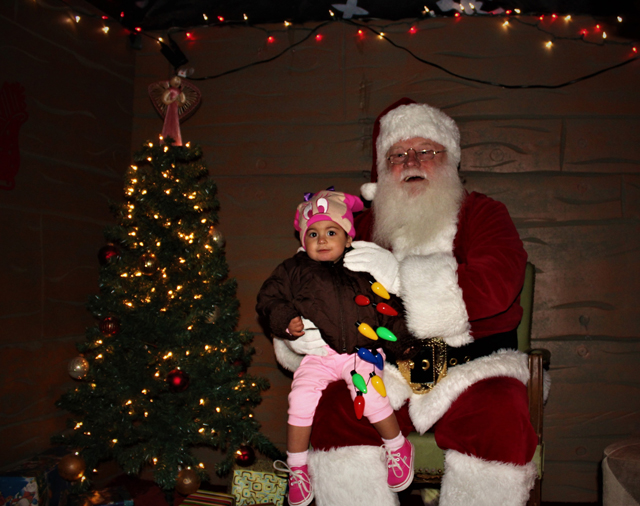 Santa and Vanessa Denoon of Riverhead. (Credit: Elizabeth Wagner)