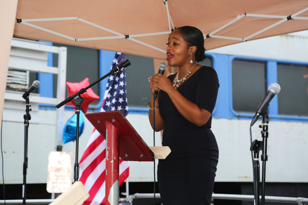 Amanda-Camille Isaac sings "God Bless America."