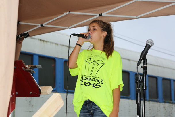 17-year-old Chelsea Plank from Stony Brook sings the "Star-Spangled Banner."