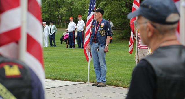 The Patriot Guard Riders stand at attention during Monday's ceremony at Calverton National Cemetery. (Credit: Grant Parpan)