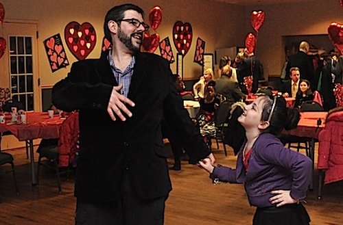 Adam Intravia and his daughter Erin, 8, dance their hearts out. (Cyndi Murray photo)