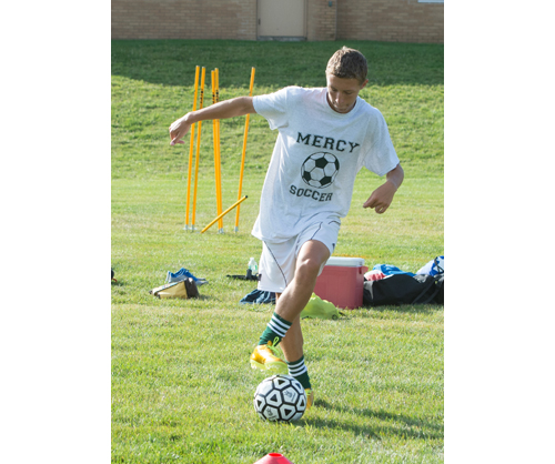 Alex Frabizio dribbles the ball during practice last week. (Credit: Robert O'Rourk)
