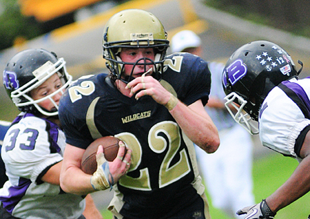 Bates BILL LANDON PHOTO | Shoreham-Wading River senior Dylan Bates rushed for 95 yards Saturday against Hampton Bays.