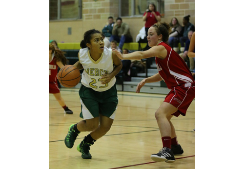DANIEL DE MATO PHOTO | Bishop McGann-Mercy's Juliana Cintron-Leonardo driving against Southold/Greenport's Kathleen Tuthill.