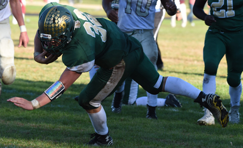 Sam Schrage crosses the goal line for Bishop McGann-Mercy's game-clinching touchdown against East Hampton/Bridgehampton. (Credit: Robert O'Rourk)