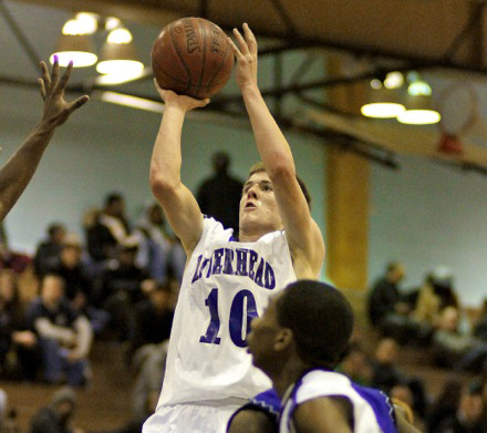 Bitzer GEORGE FAELLA PHOTO | Riverhead guard Ryan Bitzer pulls up for the short jumper against North Babylon Tuesday night.