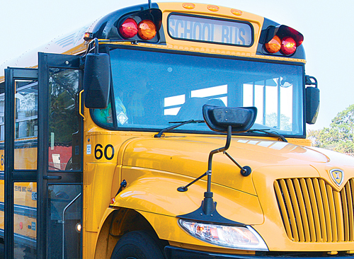 A Riverhead School District-owned school bus. (Credit: Barbaraellen Koch)