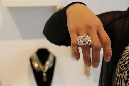 CARRIE MILLER PHOTO | Wendy Martinez shows off a piece of piece of custom-made jewelry.
