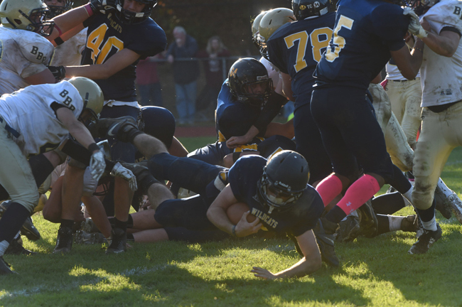 Shoreham-Wading River junior Chris Rosati crosses the goal line for the Wildcats' final touchdown Saturday. (Credit: Robert O'Rourk)