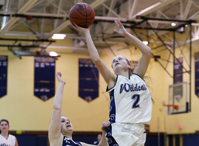 Shoreham-Wading River senior Courtney Clasen scored 24 points in the Wildcats' win Tuesday against Bayport-Blue Point. (Credit: Daniel De Mato)