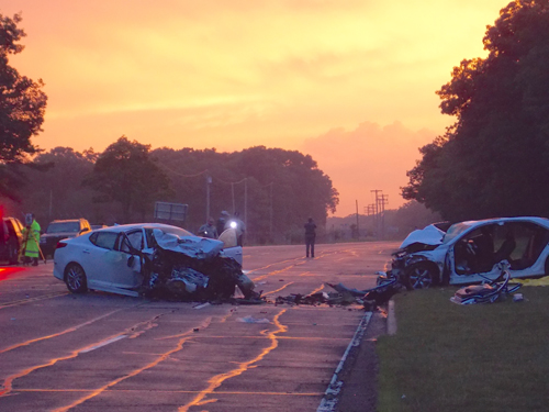A two-car crash shut down a portion of Route 25 in Calverton Tuesday night. (Credit: Joseph Pinciaro)