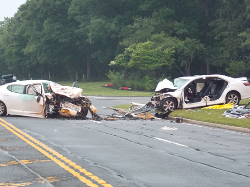 A two-car crash shut down a portion of Route 25 in Calverton Tuesday night. (Credit: Joe Werkmeister)