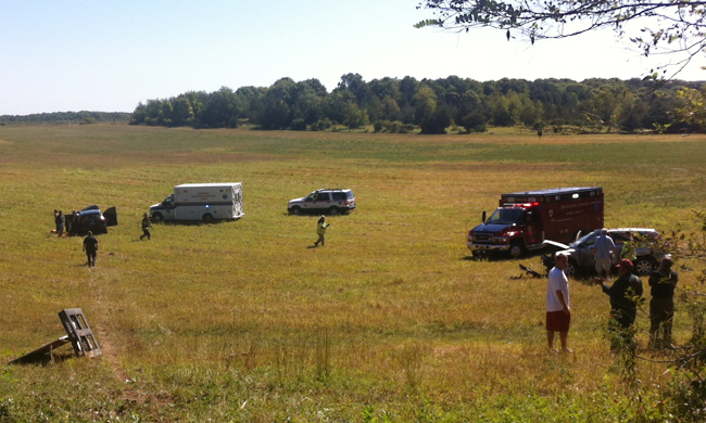 Two vehicles ended up well off the road on farmland following an accident in Calverton. There were no serious injuries. (Credit: Carrie Miller)