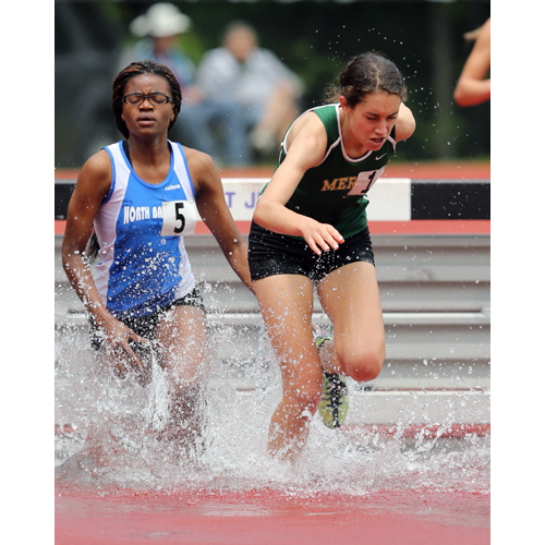 Delina Auciello of McGann-Mercy competes in the steeplechase. (Credit: Daniel De Mato)