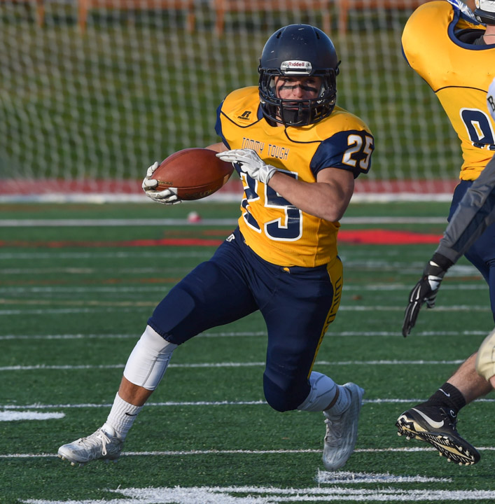 Chris Gray races around his right end for yardage.