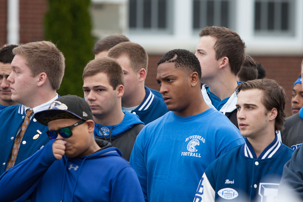 Players from 15 seasons of Riverhead football were in attendance Saturday. (Credit: Katharine Schroeder)