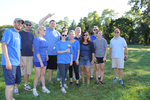 VERA CHINESE PHOTO | The Times/Review Newsgroup team celebrates its victory in the first ever East End Media Kickball Tournament.