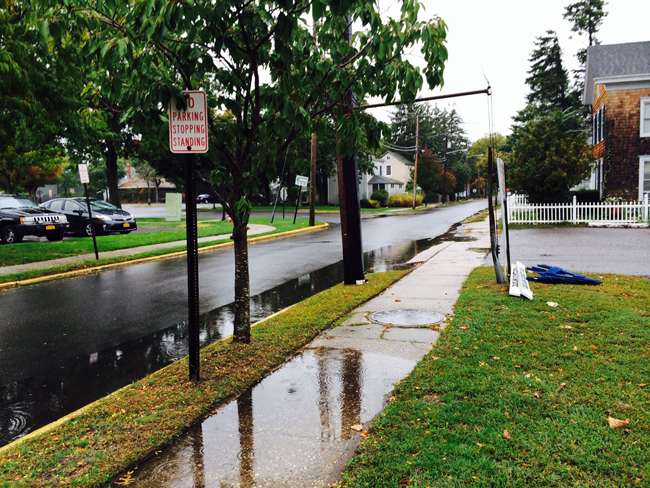 The scene Saturday morning on East Avenue in Riverhead near where a 19-year-old was shot twice. (Credit: Rachel Young)