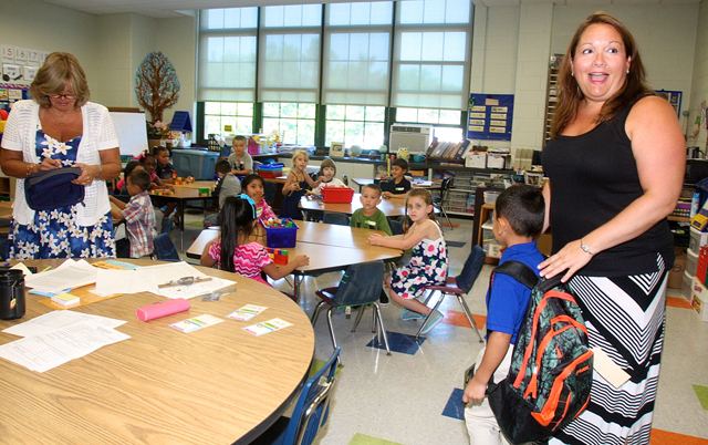 Kindergarten teacher Jennifer Barth and teacher assistant Lynn Bigrow in their new classroom.