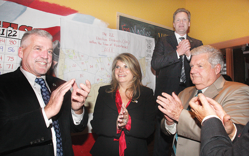 Riverhead GOP Chair Mason Haas (left), Councilwoman Jodi Giglio, Supervisor SEan Walter (back) and Councilman John Dunleavy on Election Night last year.
