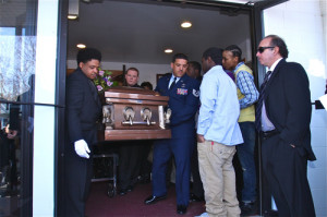 BARBARAELLEN KOCH FILE PHOTO | Pallbearers carrying the casket out the Demitri Hampton funeral at Galilee Church of God in Christ last month.