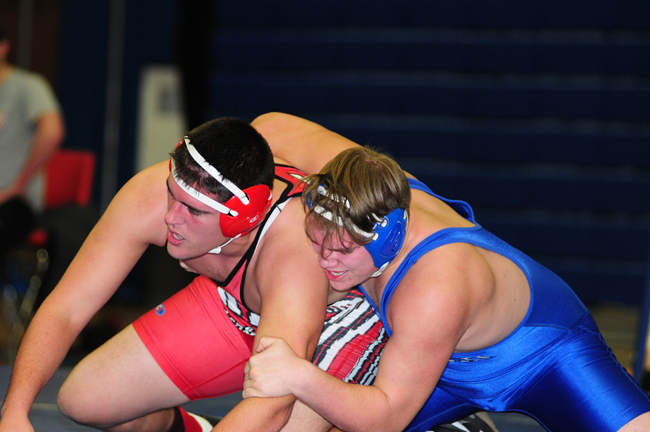 Riverhead's Justin Hansel wrestles against Cameron Byrne of Hills East in a dual meet Jan. 9. (Credit: Bill Landon)