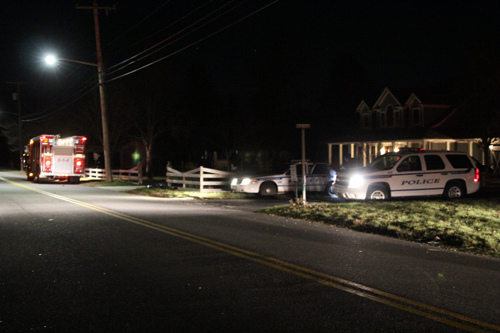 Witnesses told police a white pickup fled southbound on Herricks Lane in Riverhead after striking a pedestrian. (Credit: Jen Nuzzo)