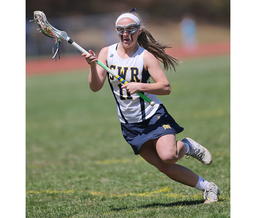 Shoreham-Wading River senior Logan Hoffmann scored 4 goals with 3 assists Saturday. (Credit: Garret Meade)