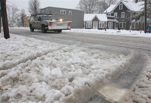 BARBARAELLEN KOCH PHOTO | The intersection of Swezey Avenue and Pulaski Street was clogged with the heavy slushy snow.