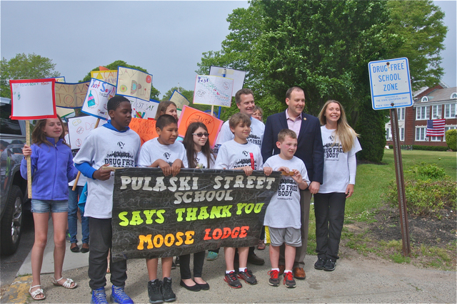 Samanatha Heidtmann with Supervisor Sean Walter and Congressman Lee Zeldin at the start of the parade. (Credit: Barbaraellen Koch)