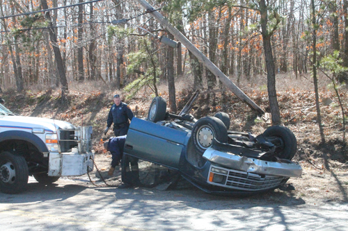 PAUL SQUIRE PHOTO | A man was hospitalized Tuesday afternoon in a rollover accident in Calverton, police said.