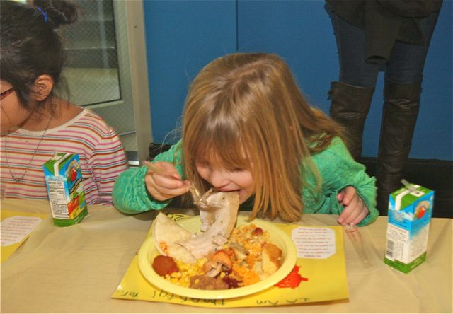 Students enjoy the feast. (Credit: Barbaraellen Koch)