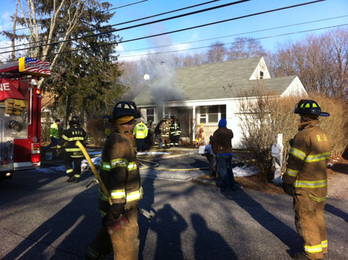 CARRIE MILLER PHOTO | Firefighters at the scene of a basement fire on Kay Road in Calverton.