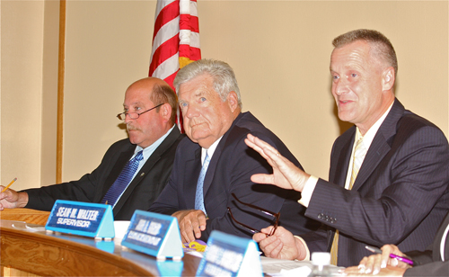 Town Board members Jim Wooten and John Dunleavy, left, and Supervisor Sean Walter at Wednesday night's Town Board meeting. (Credit: Barbaraellen Koch)