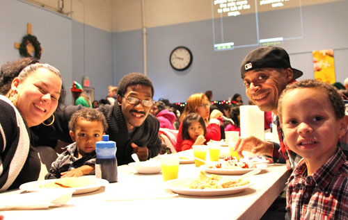 JOSEPH PINCIARO | Jessica and Isaac Sanchez, left, with Bryan Quinitchett. On the right, Warren and Elijah Moore.