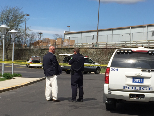 Police said a woman attacked another woman in a hotel parking lot on Friday afternoon. (Credit: Paul Squire)