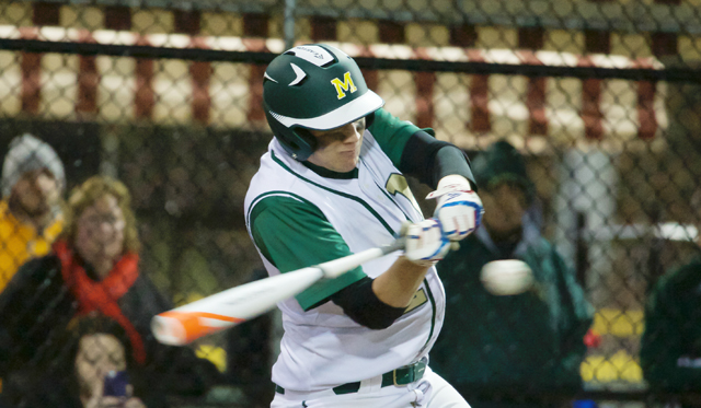 McGann-Mercy center fielder Jasper Bradley bats in Monday night's game against Babylon. (Credit: Robert O'Rourk)