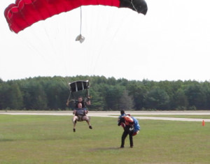 Mr. Halpin safely reaches the ground. (Credit: Tim Gannon)