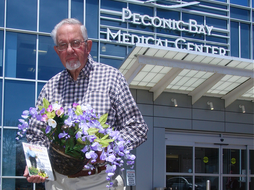Joe Van de Wetering, the Garden Festival's founder, outside Peconic Bay Medical Center on Friday. (Credit: Barbaraellen Koch)
