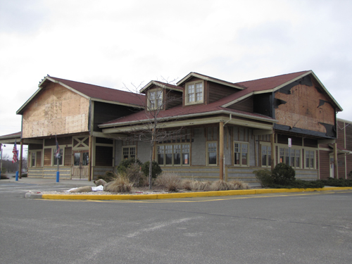 TIM GANNON PHOTO | The Boulder Creeks signs have been removed from the Route 58 building. Joe's Crab Shack is on its way.