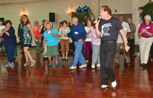 Alfonso Triggiani of Westhampton Beach teaching the 'Electric Slide' to joint replacement patients. (Credit: Barbaraellen Koch)