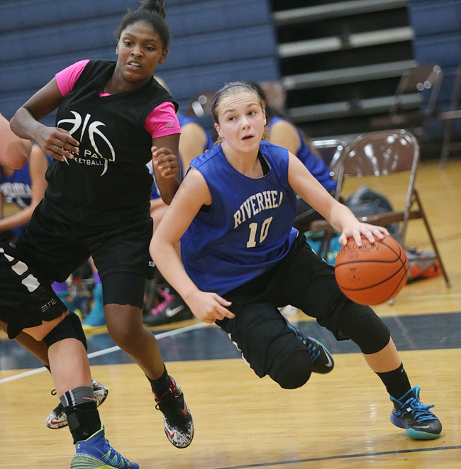 Riverhead guard Kate McCarney drives toward the basket against Deer Park Wednesday night. (Credit: Garret Meade)