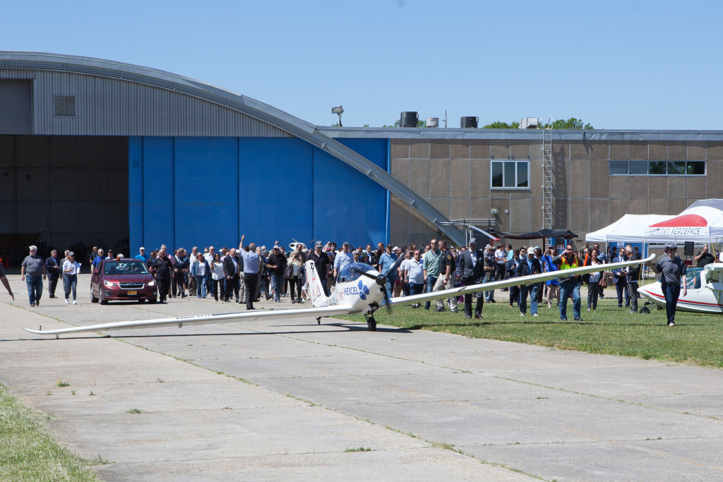 The aircraft is escorted to the runway. (Credit: Katharine Schroeder)