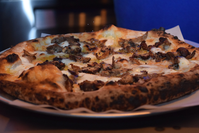 Mushroom truffle pizza with four cheeses. (Credit: Vera Chinese)