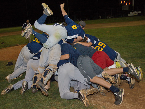 GARRET MEADE PHOTO | The North Fork Ospreys formed a happy pile after winning their second league championship in four years.