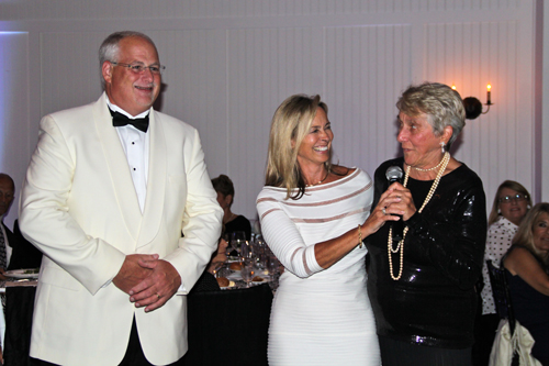 PBMC Health CEO Andrew Mitchell, board of directors president Sherry Patterson, and foundation member Marguerite Strauss speaking at the benefit.