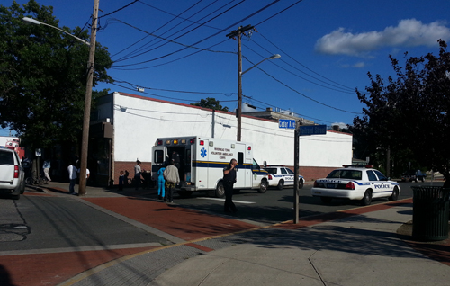 JENNIFER GUSTAVSON PHOTO | Police respond to the corner of Cedar Avenue and Railroad Street Saturday afternoon.