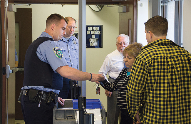 Tight quarters heading into and out of Riverhead Town Justice Court makes Police Chief David Hegermiller and Town Supervisor Sean Walter believe that arming court officers with guns would not be safe. Others think it would make the court safer. (Credit: Paul Squire)